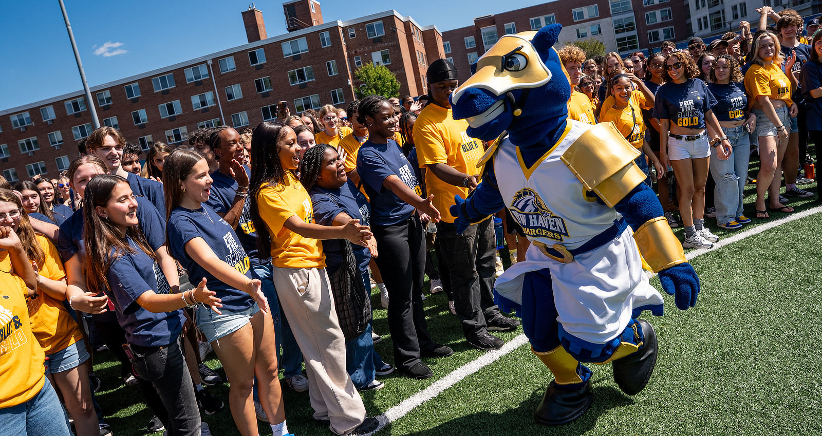 Charlie and students on campus