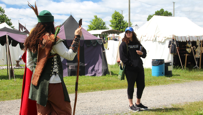 Daniela Perez ’23 (right) and a cast member.