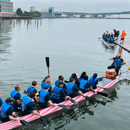Charlie’s Chargers powered on to win third place! A bunch of UHN professors and students row in a long boat.