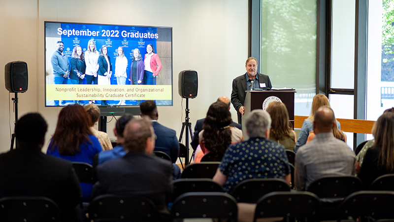 Dr. Ron Kuntze speaks as part of the graduation ceremony.