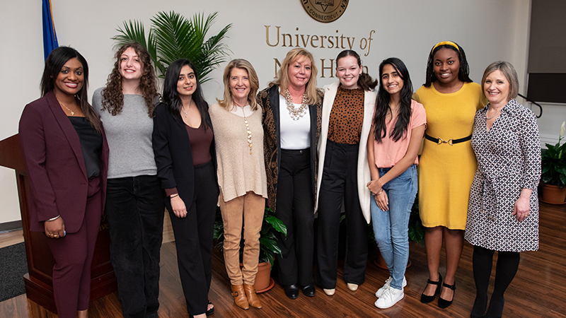 Cindi Bigelow (fourth from left) with members of the University community. 