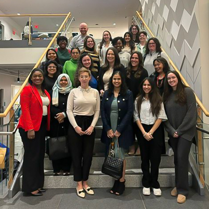 Courtney McNelis, '23 (center) at University of New Haven's Women in Business Club and SHRM Chapter Panel Discussion (2024)