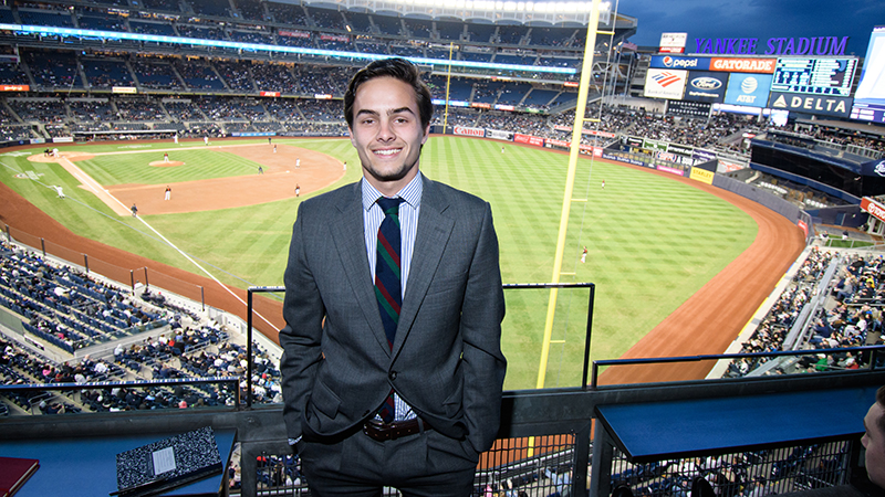 Simão Sousa Branca ’18 M.S. at Yankee Stadium in New York as part of a site visit organized while he was a student.