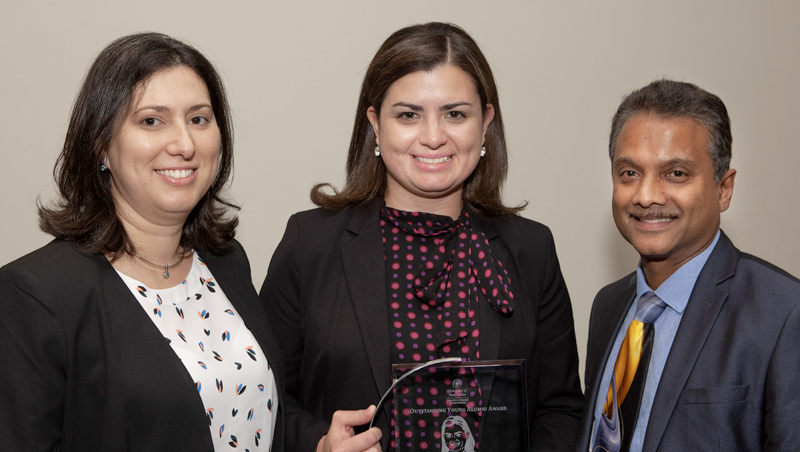 Photo of Prof. Maria-Isabel Carnasciali, Carolina Ramirez-Blier '09, and Dean Ron Harichandran