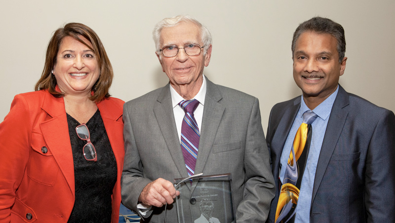 Photo of Elaine Rampone '92 M.S., Nichola Squeglia ’60 A.S., ’63 A.S., and Dean Ron Harichandran