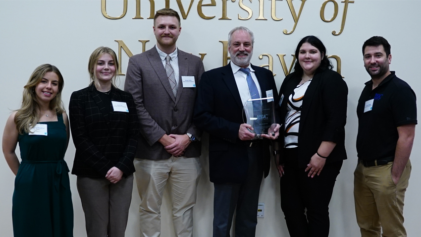 Kenneth Giuntoli ’91 MBA, executive director of business development at RBC and a member of the Tagliatela College of Engineering’s Advisory Board, with RBC employees who are University of New Haven alumni