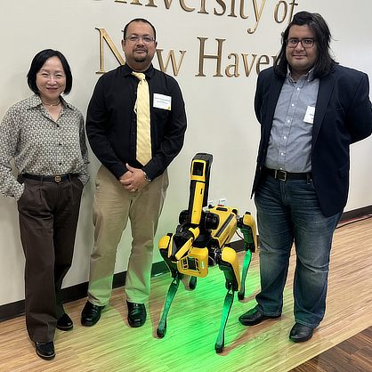 Dr. Cheryl Li, Dr. Shayok Mukhopadyay, and Dr. Vahid Behzadan with Spot the robot