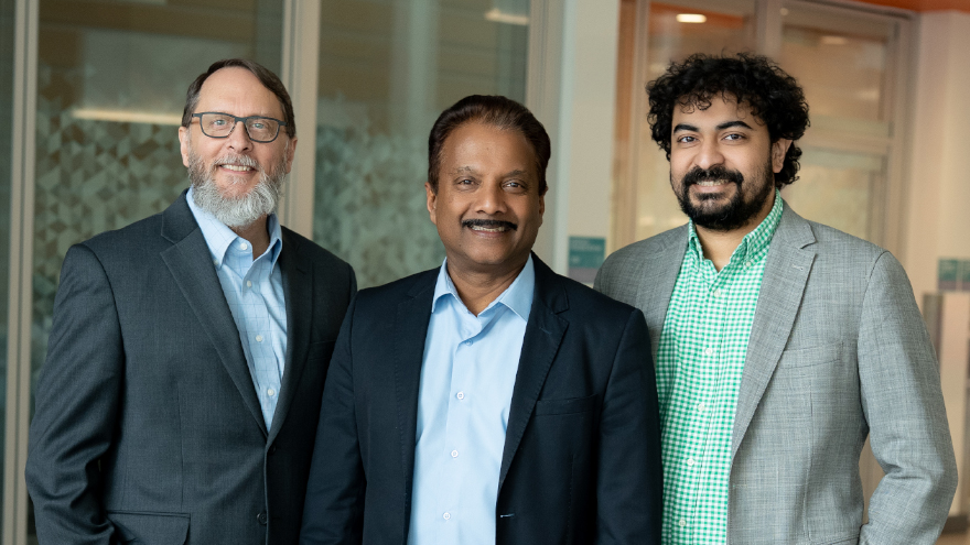 (from left to right) Chris Standish, executive director of Research Administration; Ron Harichandran, Ph.D., P.E., F.ASCE, Dean of the Tagliatela College of Engineering; Ganesh Balasubramanian, Ph.D., Lambrakis associate professor and chair of the Department of Mechanical and Industrial Engineering