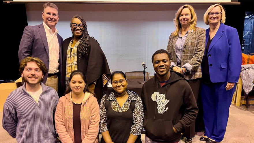 Joshua Dennis Krah ’27 MPH (front row, furthest right), Pooja Arugula ’27 MPH, and Chandira Malla ’27 MPH with expert panelists