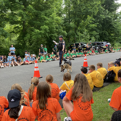 Police lead a K-9 demonstration for local kids.