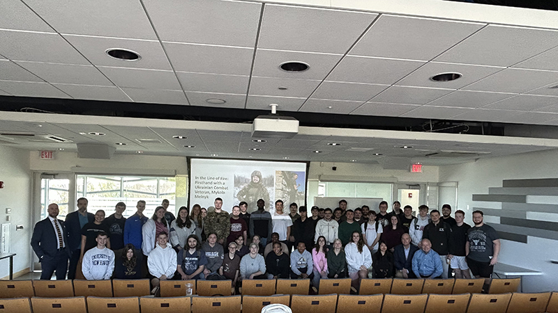 Students, faculty, and staff with Sr. Lt. Mykola Melnyk.