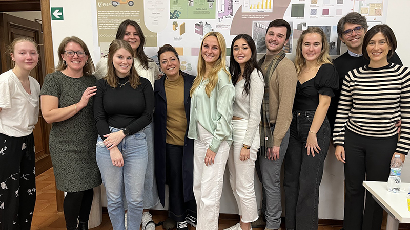 Prof. Slenker (second from left) with students and members of the Prato community who came to see their project.