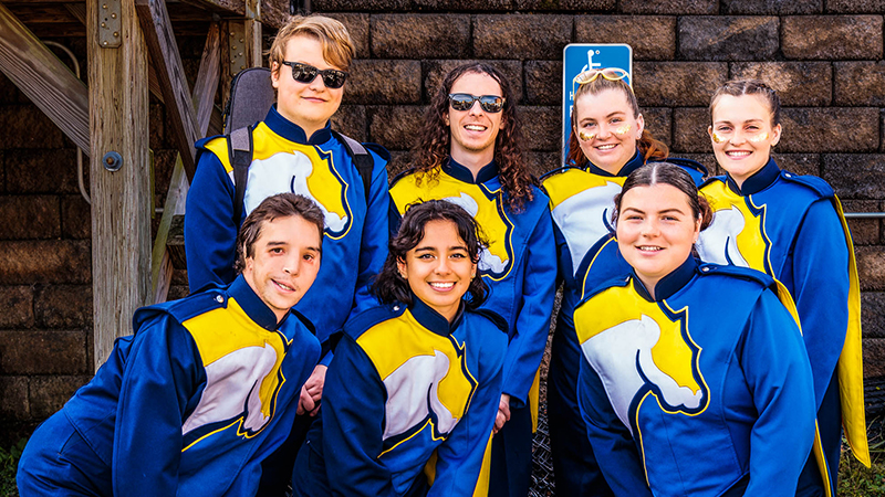 Ryan Bell ’23 (left, front) with several of his fellow Marching Band members.