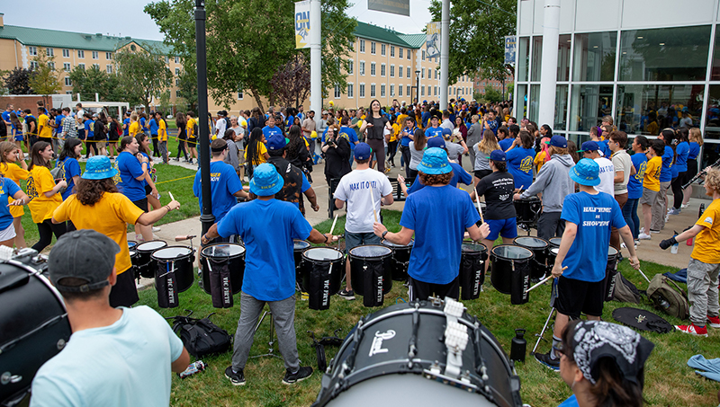 Charger Marching band playing instruments.