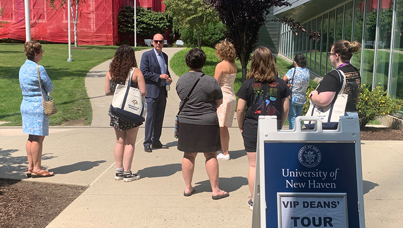 Dr. David Schroeder leads a tour for new members of the Lee College. 