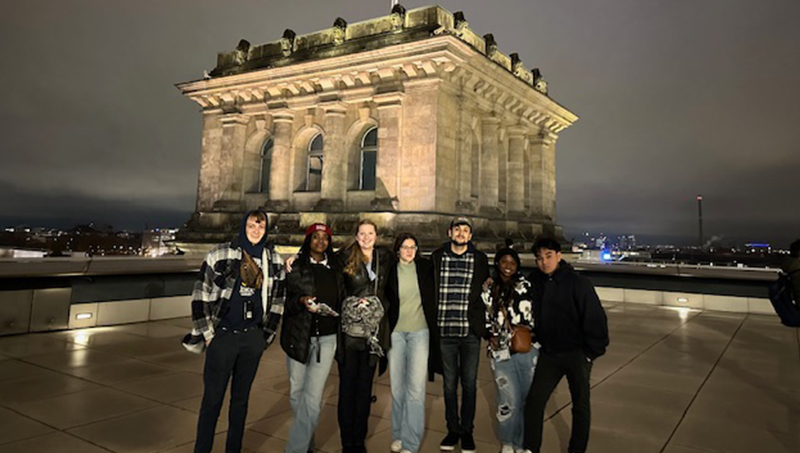 Students posing in front of a monument in Germany.