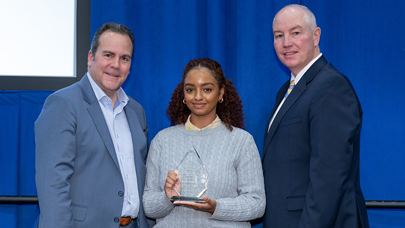 Left to right: Sheahon Zenger, Ph.D.; Azza Hussein ’23 M.A.; and Gregory Eichhorn, MBA, vice president for enrollment and student success.