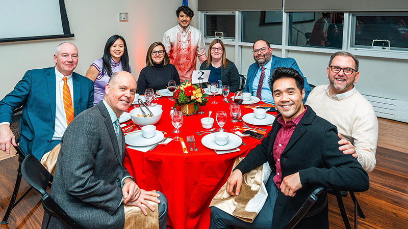 Bryan Cadavos ’23 (back, center) with his fellow Chargers at the Lunar New Year Celebration.