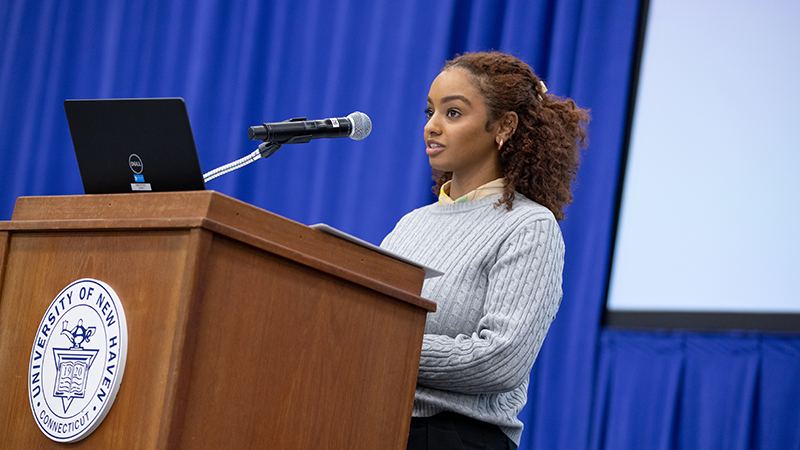 Azza Hussein ’23 M.A. receiving an MLK Vision Award.