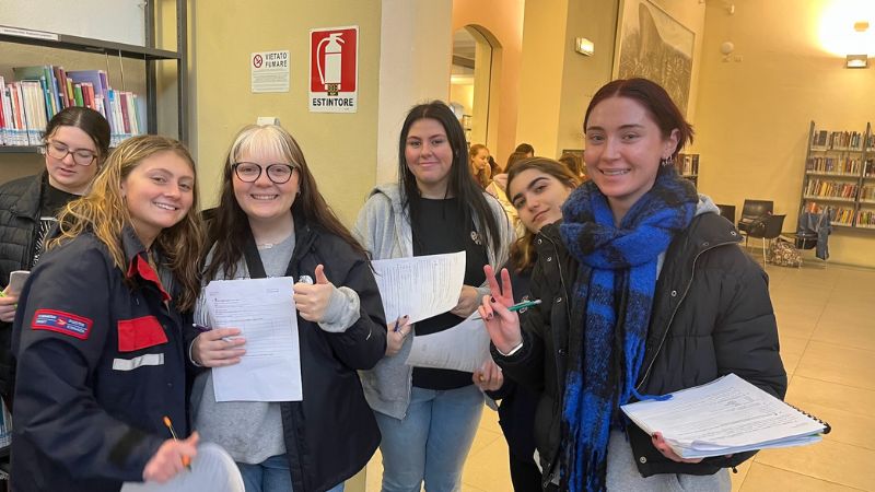 Chargers take part in a scavenger hunt in an Italian library. 