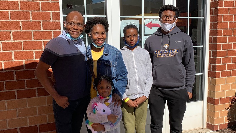 Akinbusola Akinwunmi and his family on Family Day.