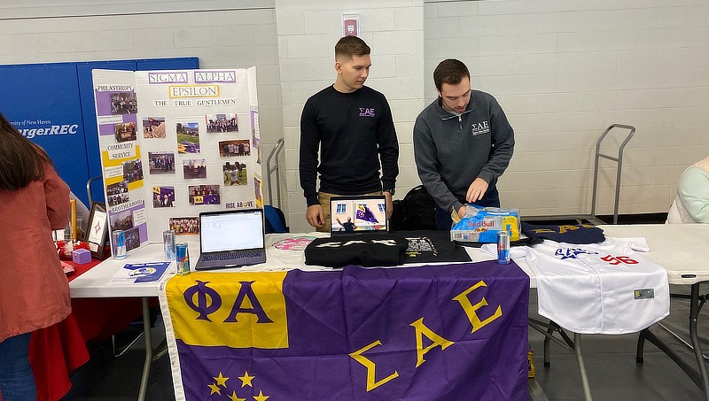 Image of Daniel Kwiatkowski ’21 at SAE table.