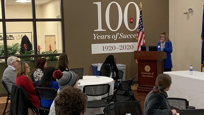 Josephine Moran ’01 M.S., ’19 EMBA speaking at a Women’s Leadership Council