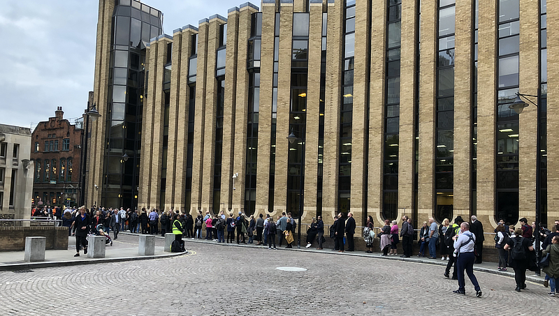 People lined up to enter Westminster Abbey.