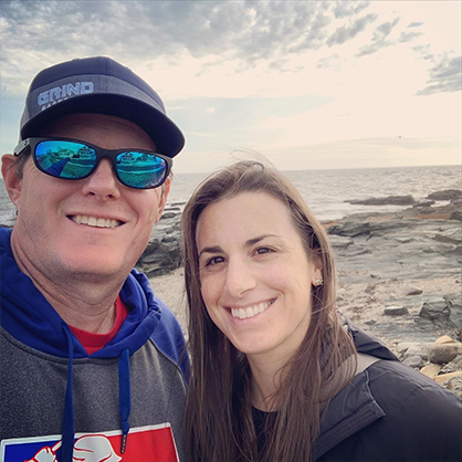 Image of Jessica Scibek and her husband Eric out for a winter walk by the water.