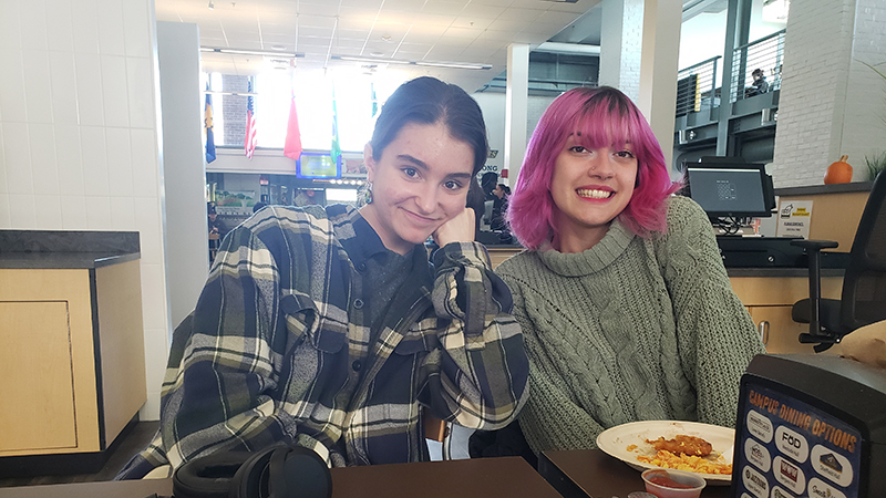 Beatrice Glaviano ’26 (left) and her friend Serenity Roberts ’26 on campus. 