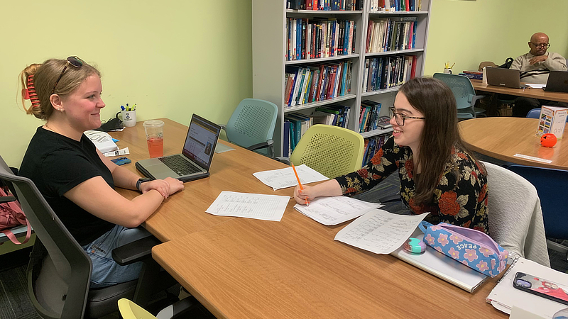 Kathryn Conger '24 and Carly Costello '26 studying