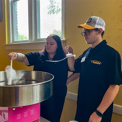 Members of the University enjoyed cotton candy as part of Family Day.