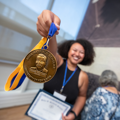 Aiyannah Lewis ’24 with her award.