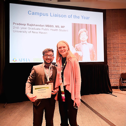 Pradeep Rajbhandari ’24 MPH (left) received the Campus Liaison of the Year Award.