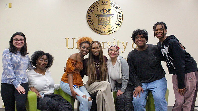 Dominique Jackson (center) met several members of the Charger community.