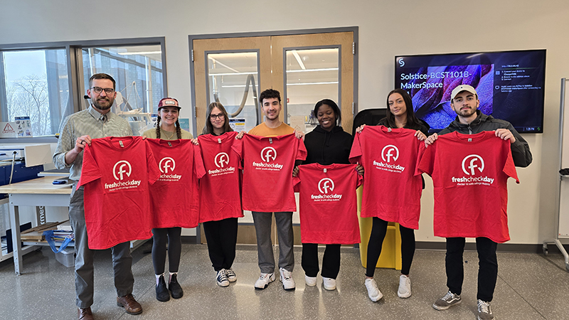 Chargers with the t-shirts they created for Fresh Check Day.