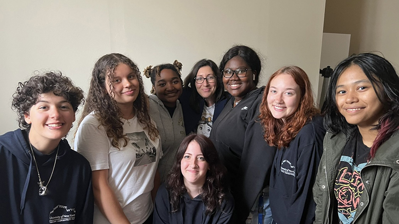 Lara Pugi (back, center) with students in Italy.