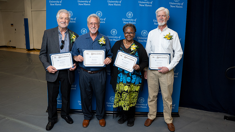 John Mitchell ’83, Al Celotto, Linda Copney-Okeke ’91, ’94, ’02 M.A., and Gordon Simerson, Ph.D., are all celebrating 40 years of service at the University of New Haven.